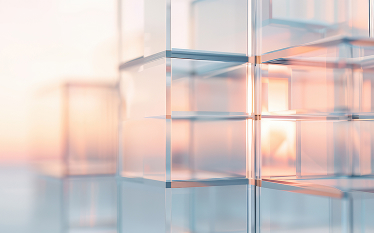 Abstract close-up of transparent glass or acrylic blocks reflecting soft light in pastel tones, creating a modern and minimalistic aesthetic.