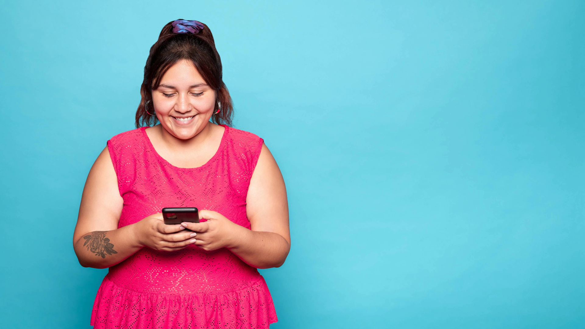 woman looking at phone