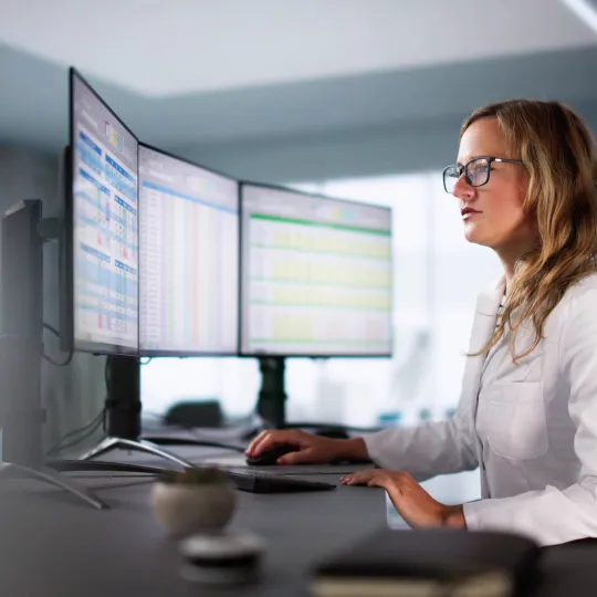 Person typing on computer keyboard