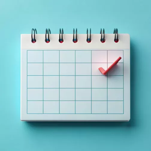A calendar with a check mark on it