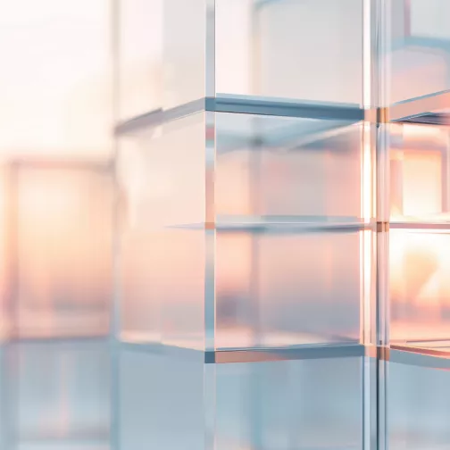 Transparent glass cubes against a sunny background